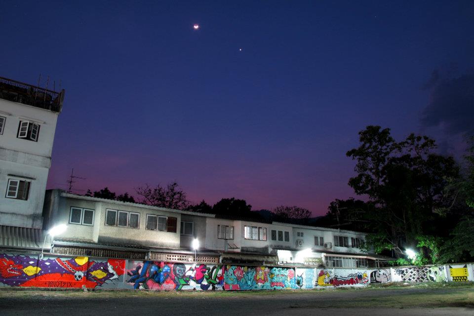 nighttime wall graffiti
